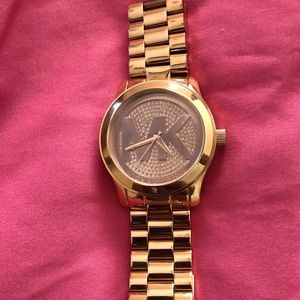 Michael Kors ladies Rose Gold watch.